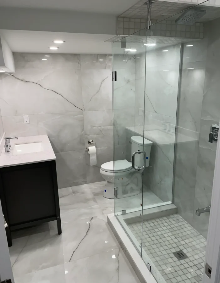 Bathroom remodel walk-in shower and fully marbled - Nassar Renovations, Plumbing & Heating. Specializes in Bathroom Renovations, Basement Renovations, Kitchen Renovations, and plumbing. Operating in Brampton, Mississauga, Toronto, and Scarborough.